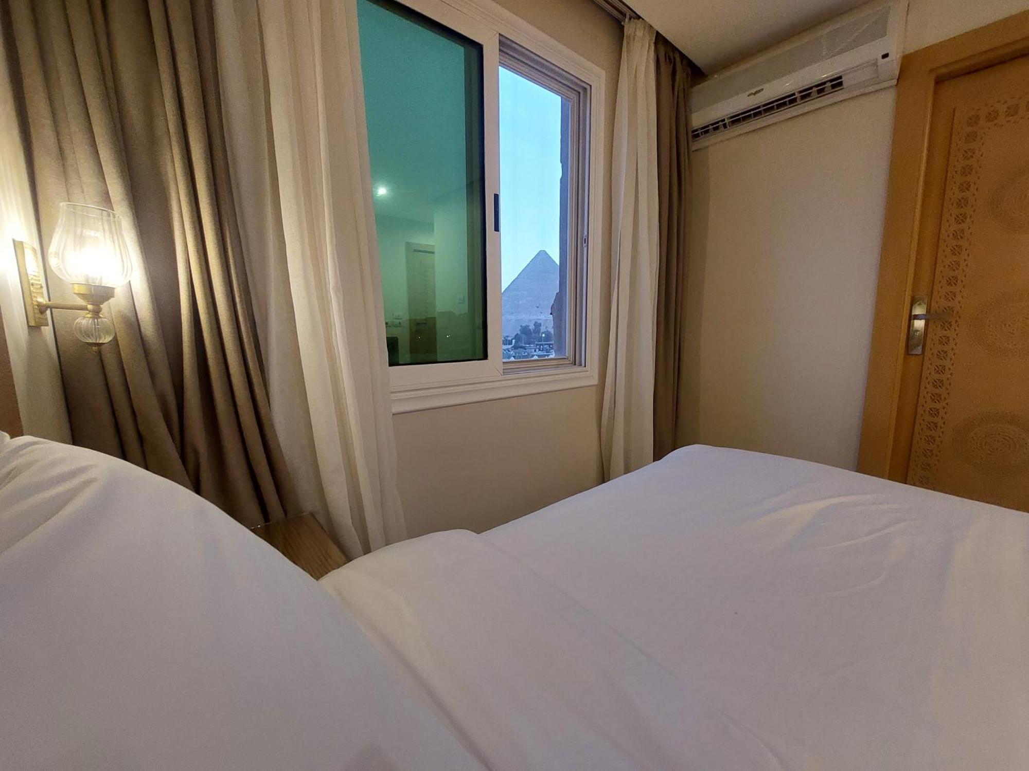 Doudou Pyramids View Hotel Kafret el-Gabal Kültér fotó