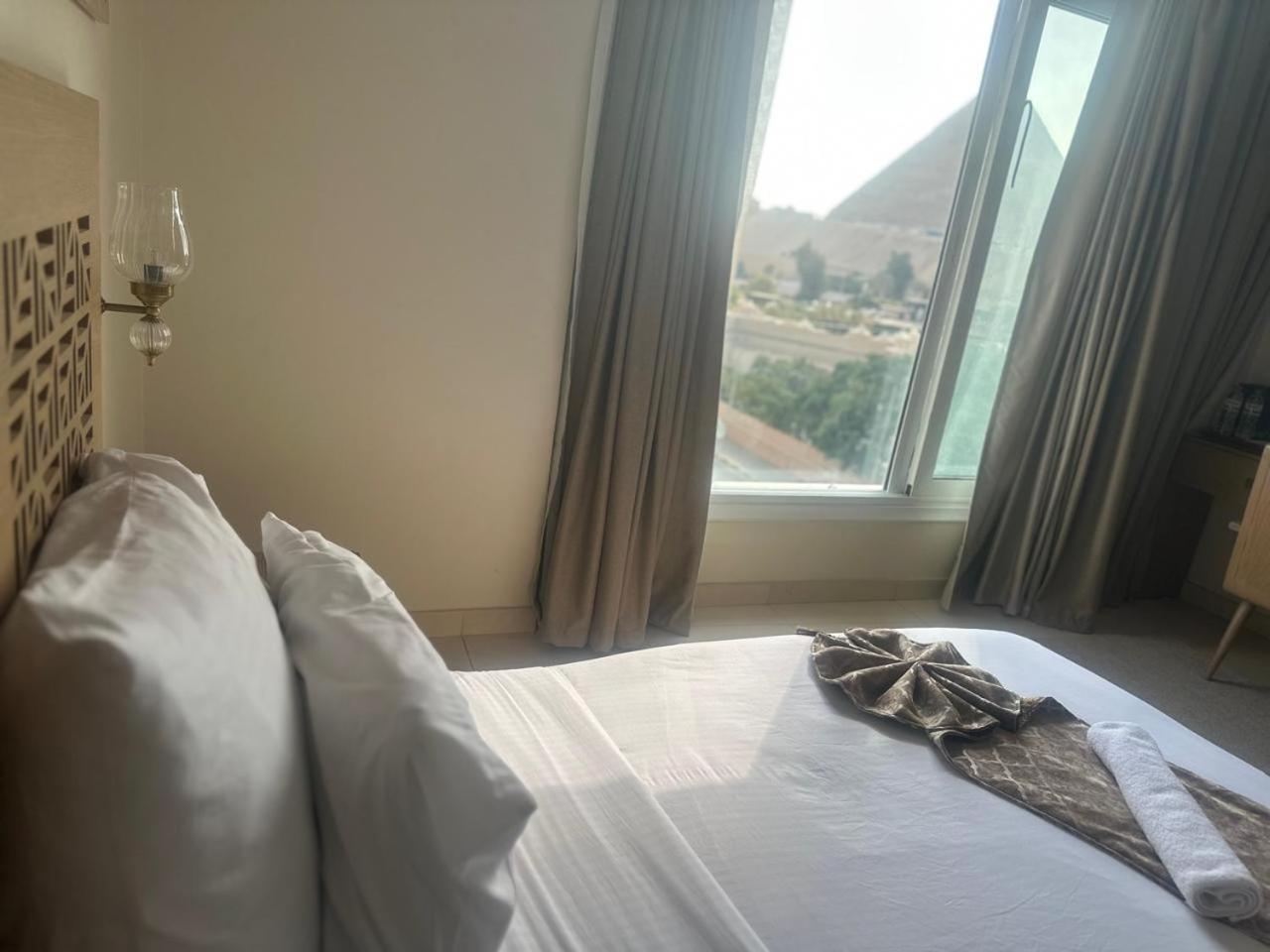 Doudou Pyramids View Hotel Kafret el-Gabal Kültér fotó