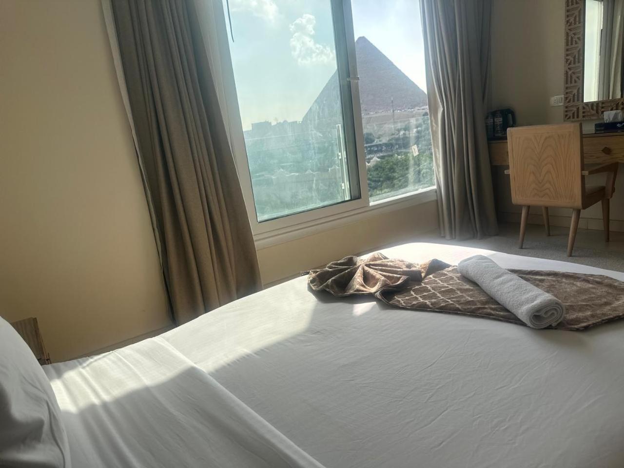 Doudou Pyramids View Hotel Kafret el-Gabal Kültér fotó