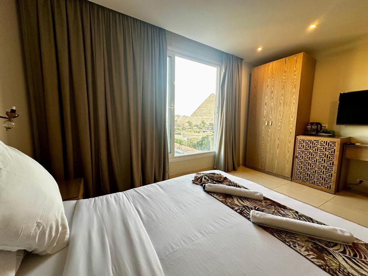 Doudou Pyramids View Hotel Kafret el-Gabal Kültér fotó